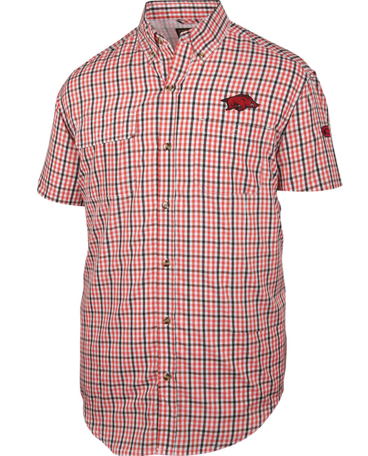 Arkansas Gingham Plaid Wingshooter's Shirt S/S: A checkered shirt with a vented mesh back, large chest pocket, and embroidered pig patch.