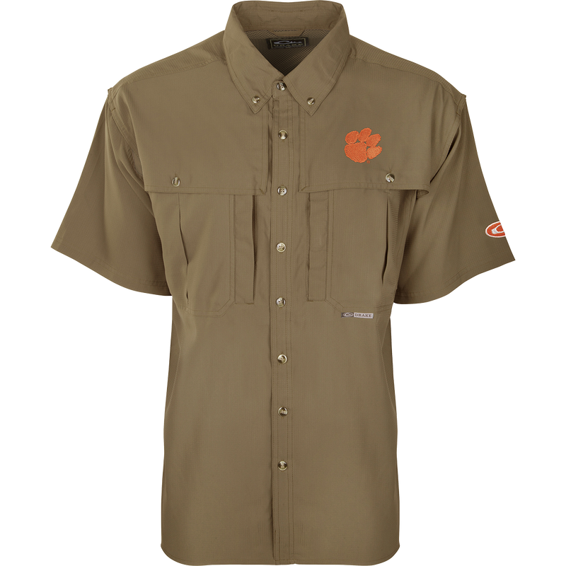 Clemson S/S Flyweight Wingshooter: A lightweight, breathable shirt for warm-weather outdoor activities. Features vented back design, quick-drying Flyweight fabric, UPF 50+ sun protection, Magnattach chest pocket, and a vertical zipper pocket.