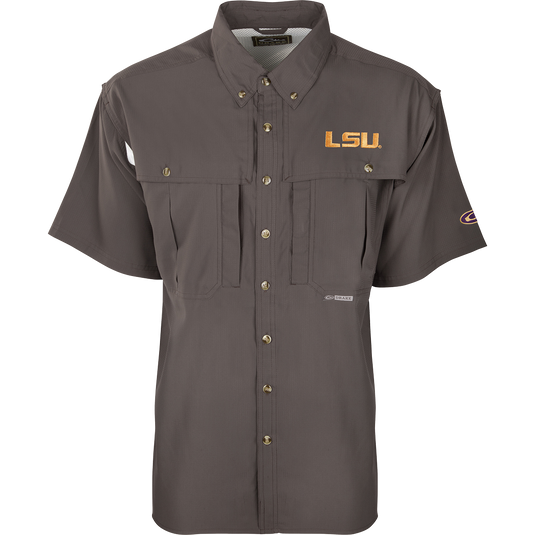 LSU S/S Flyweight Wingshooter: A lightweight, moisture-wicking shirt with vented back design. Features UPF 50+ sun protection, chest pockets, and a zippered pocket. Ideal for warm-weather outdoor activities.