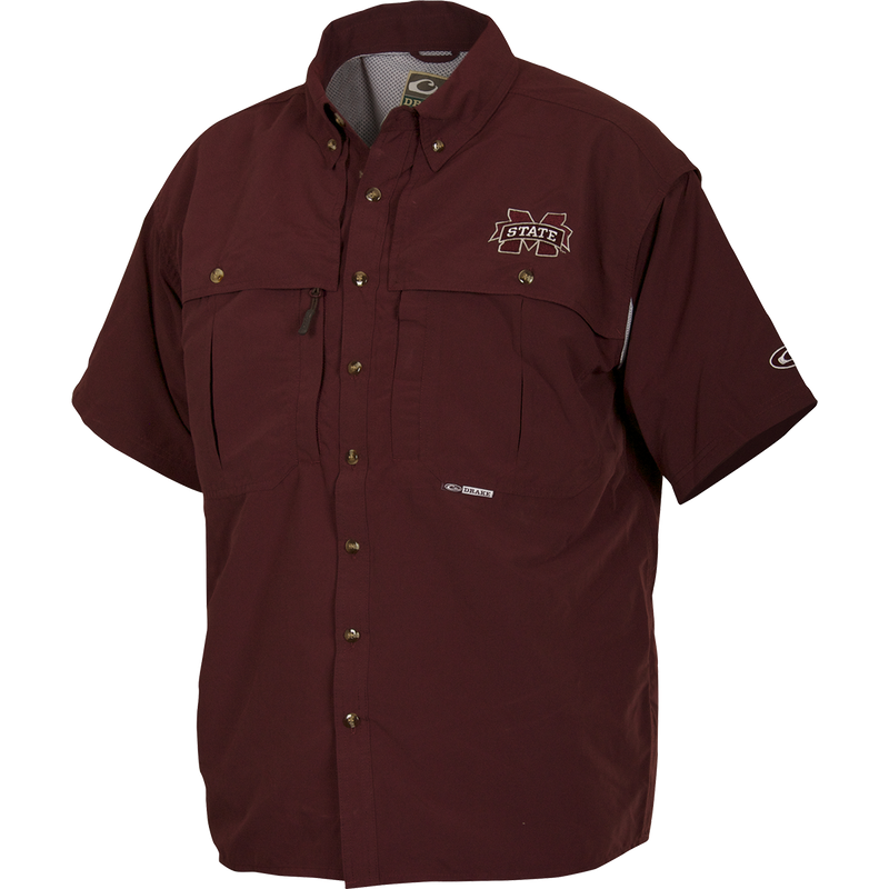 A breathable, quick-drying Mississippi State Wingshooter's Shirt with front and back ventilation. Features oversized chest pockets, Magnattach™ pocket, and zippered pocket.