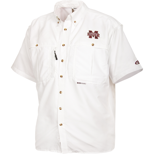 A white Mississippi State Wingshooter's Shirt with logo, seven button design, front and back ventilation, and multiple chest pockets.