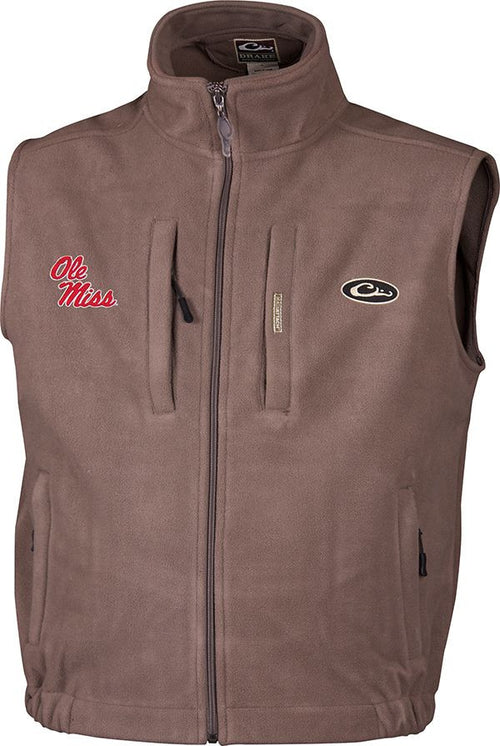 Ole Miss Windproof Layering Vest: Brown vest with logo embroidery on right chest. Windproof, water resistant ultra-warm fleece. Stand-up collar, zippered pocket on chest, call pocket, and handwarmer pockets. High quality hunting gear from Drake Waterfowl.