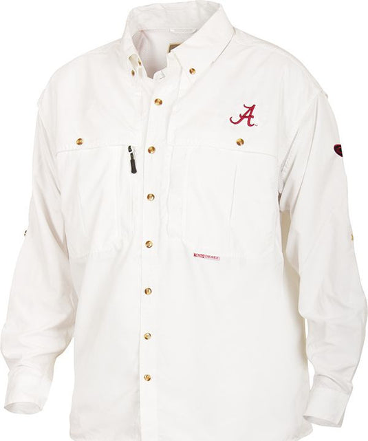A white Alabama Wingshooter's Shirt L/S with a red letter on it. Breathable, cool, and quick-drying. Features front and back ventilation, oversized chest pockets, and a Magnattach™ pocket. Perfect for Game Day.