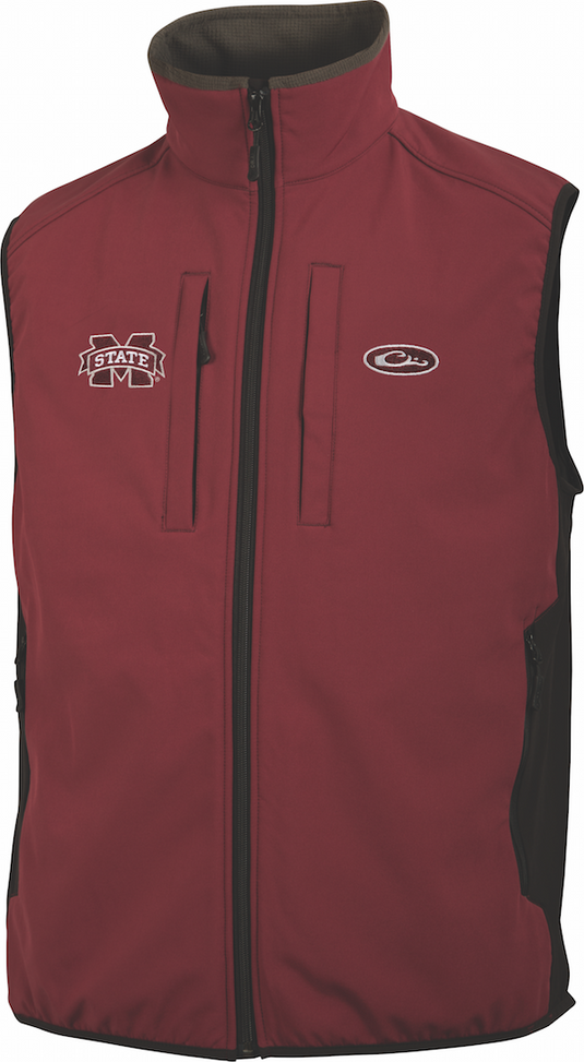 A red vest with a logo on it, featuring a vertical Magnattach chest pocket, zipper closures, and side stretch panels. Windproof and made of 100% polyester.