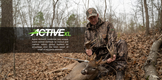 A man holding a large antler, representing high-quality hunting gear and clothing for big game, waterfowl, turkey hunting, and fishing.