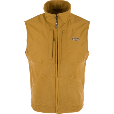 MST Eqwader Vest showcasing upper waterproof fleece and breathable lower polyester, featuring chest Magnattach™ and zippered pockets, designed for hunting efficiency and comfort.