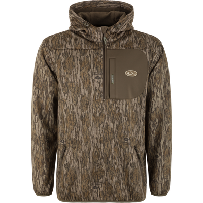 MST Endurance Quarter Zip Jacket with Hood on mannequin, featuring Mossy Oak Bottomland camo, zippered chest pocket, draw-cord hood, and side hand pockets for outdoor use.