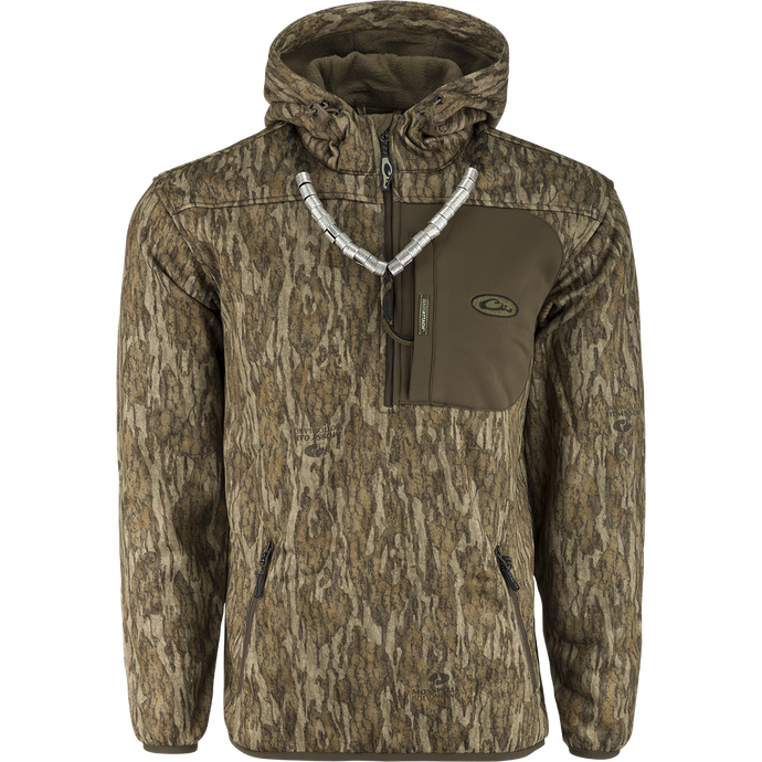 A high-performance MST Endurance 1/4 Zip Jacket with Hood for hunters. Features include Magnattach™ chest pocket, zippered lower pockets, and fleece-lined hood for comfort and functionality.