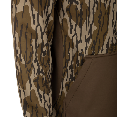 MST Endurance Hoodie With Kangaroo Pouch, featuring a vertical Magnattach™ chest pocket, zippered lower pockets, and a fleece-lined hood, shown in a close-up view.