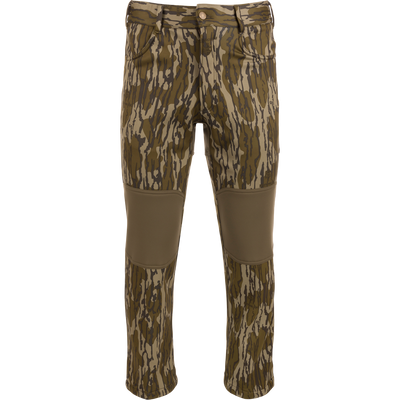 Endurance Jean Cut Wader Pant with camouflage design, featuring front slash pockets, rear pockets, and an adjustable waist, ideal for hunting and outdoor activities.