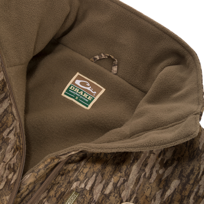 Close-up of the MST Half Zip Eqwader Jacket, showcasing the waterproof upper fabric and fleece lower body with visible label detailing.