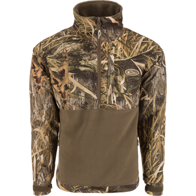 MST Half Zip Eqwader Jacket featuring a camouflage design, waterproof upper body, breathable fleece lower body, zippered pockets, and adjustable neoprene cuffs for optimal hunting comfort.