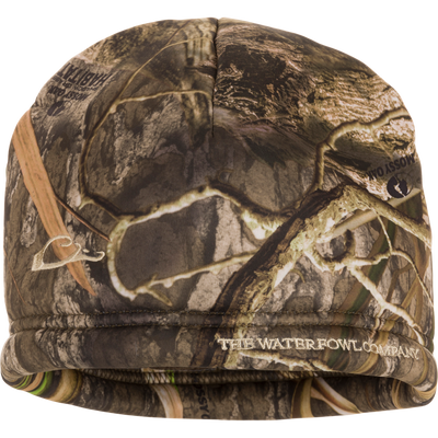 Close-up of The Waterfowl Company Softshell Sherpa Beanie, featuring durable 100% polyester fabric with warm Sherpa fleece lining, ideal for outdoor activities.