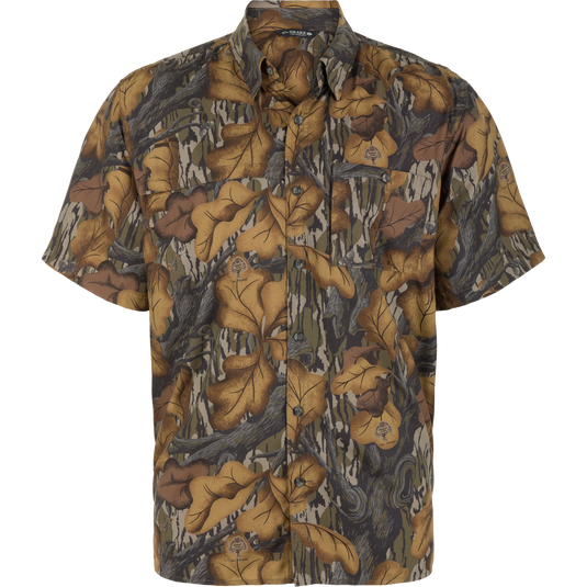 8-Shot Flyweight Shirt, a short-sleeved, moisture-wicking button-down featuring a brown and green camouflage leaf pattern.