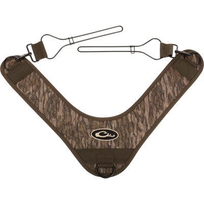 3-Way Duck Tote with Mossy Oak camo pattern features metal hooks and quick-attach clips for carrying shotguns or rifles hands-free across your chest.