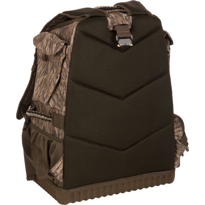 Tree Hugger Timber Pack: rugged camo-patterned backpack with padded mesh back, molded hard bottom, adjustable straps, and camouflage side pouches for hunting gear storage.