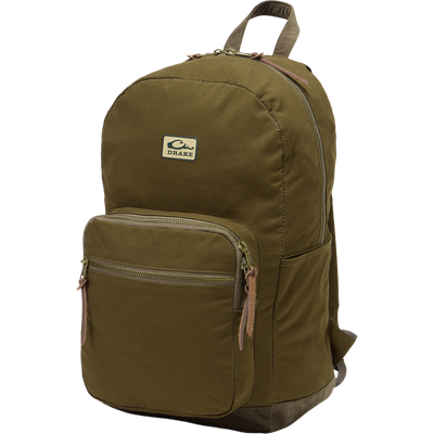 Limited Edition Throwback 80 Backpack with durable cotton canvas, suede bottom, and antique bronze buckles, ideal for rugged outdoor adventures and extensive hauling needs.