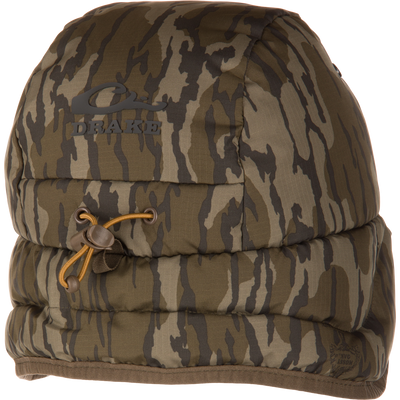 Close-up of Drake's LST Down Hat, featuring tiger-stripe camo with a raised DRAKE logo, toggle-and-drawcord adjustment, and premium insulation for lightweight warmth.