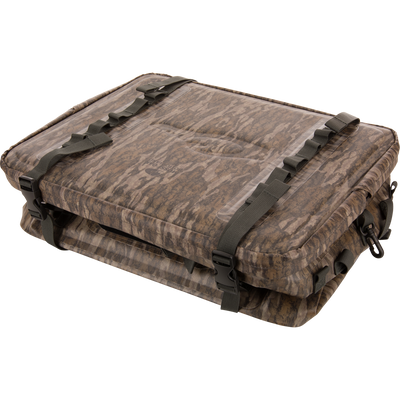 Camo-patterned HND Carry All Collapsible Storage Bag with padded soft-shell, heavy nylon straps, and quick-release buckles, designed for versatile outdoor gear protection.