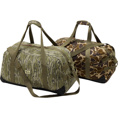 Throwback 80 Duffle Bag, crafted from durable cotton canvas with suede reinforcement, featuring robust metal buckles, ideal for hunting and adventure enthusiasts.