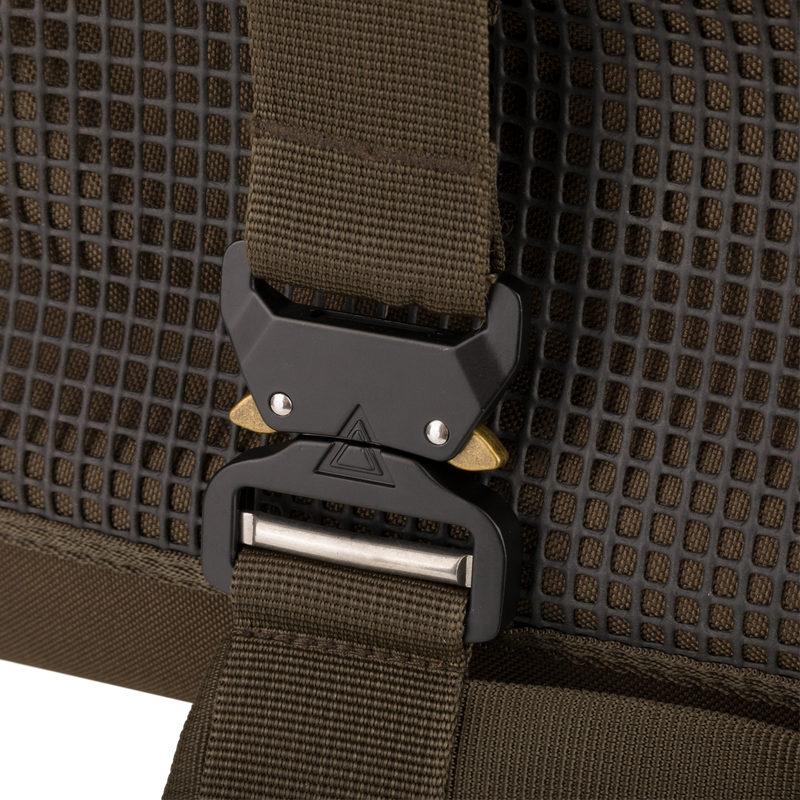 Close-up of Tree Hugger Shoulder Bag's adjustable strap with heavy-duty quick-release buckle, highlighting its durability and suitability for outdoor hunting adventures.
