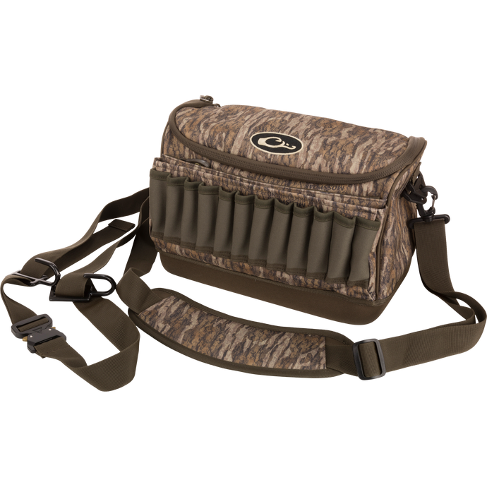 Tree Hugger Shoulder Bag with camo pattern, adjustable strap, and external elastic loops, ideal for carrying hunting gear and shotgun shells.