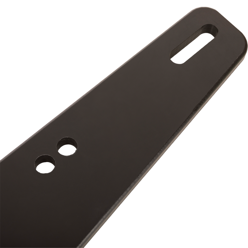 Truck Gun Rest for secure rifle transport; flat bracket with small round and large oblong holes, designed for easy installation on vehicle headrests.