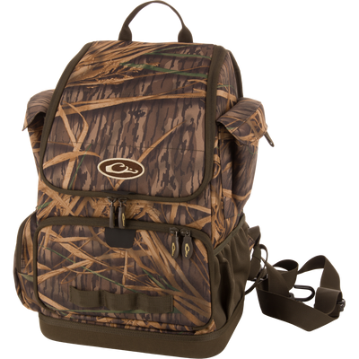 Tree Hugger Timber Day Pack with camo pattern, featuring multiple compartments, padded straps, and gear loops, designed for hunting and outdoor adventures.