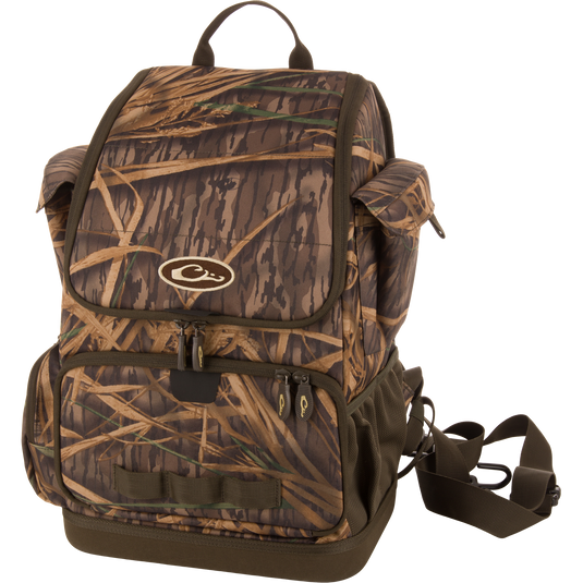 Tree Hugger Timber Day Pack with camo pattern, featuring multiple compartments, padded straps, and gear loops, designed for hunting and outdoor adventures.