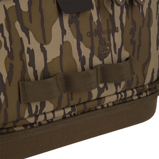 Tree Hugger Timber Day Pack featuring camo print, heavy-duty webbing, and reinforced base, ideal for outdoor excursions with durable, water-resistant construction and ample storage.