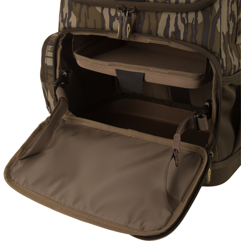 Tree Hugger Timber Day Pack with open front compartment, showing padded shelf and empty storage, designed for outdoor excursions with rugged, water-resistant features.