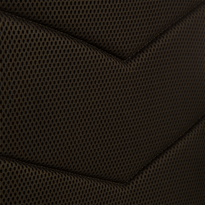 Close-up of the Tree Hugger Timber Day Pack’s padded mesh back-panel, highlighting its breathable honeycomb design and sturdy stitched seams for enhanced durability during outdoor excursions.