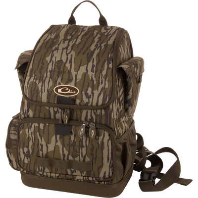 Tree Hugger Timber Day Pack with camo pattern, multiple compartments, and durable construction, designed for outdoor excursions with large storage and a waterproof bottom.