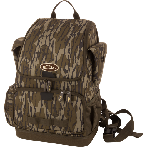 Tree Hugger Timber Day Pack with camo pattern, multiple compartments, and durable construction, designed for outdoor excursions with large storage and a waterproof bottom.