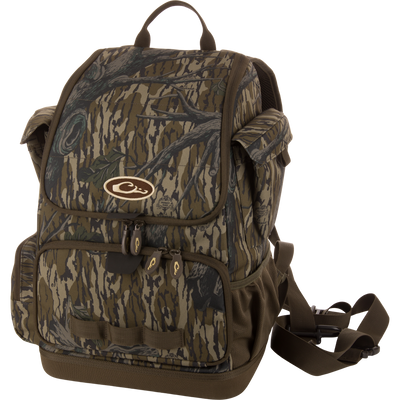 Tree Hugger Timber Day Pack with woodland camo, multiple pockets, rugged HD2™ material, waterproof bottom, and adjustable straps, ideal for outdoor hunting and fishing.