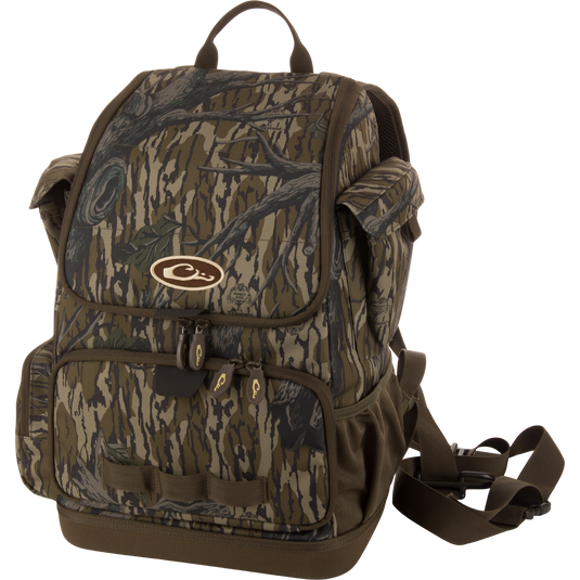 Tree Hugger Timber Day Pack with woodland camo, multiple pockets, rugged HD2™ material, waterproof bottom, and adjustable straps, ideal for outdoor hunting and fishing.