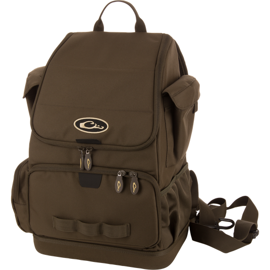 Tree Hugger Timber Day Pack with multiple pockets, adjustable straps, webbing loops, and a top carry handle, designed for durability and easy gear access during outdoor adventures.