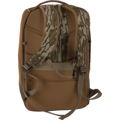 CommandXT Quick Load Pack rear view showing padded, camo-patterned shoulder straps, adjustable sternum/waist buckles, and durable design for hunting and everyday use.