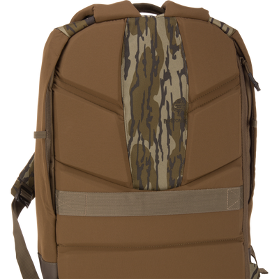 Back view of CommandXT Quick Load Pack showing padded straps, camo strip, MOLLE-style webbing, designed for durability and organization in rugged outdoor conditions.