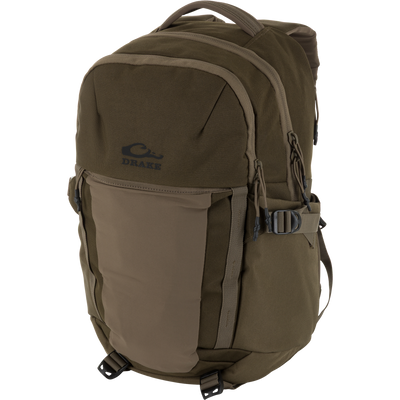 Drake Campus Backpack with multiple compartments, webbing straps, and a padded handle, designed for durability and organization, featuring a 28-liter capacity and laptop sleeve.