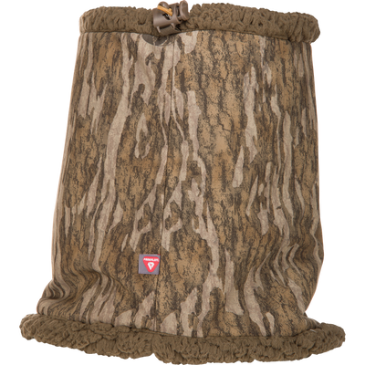 Camouflage-patterned LST BMF Gaiter with Primaloft, featuring fleece lining, adjustable drawcord, and water-resistant, windproof performance, designed for warmth and mobility in cold conditions.