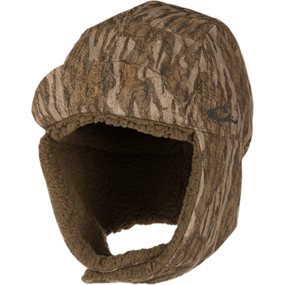 Camo-patterned LST BMF Bomber Hat with Primaloft, featuring earflaps and sherpa lining, accompanied by a matching fleece neck gaiter for cold-weather protection.