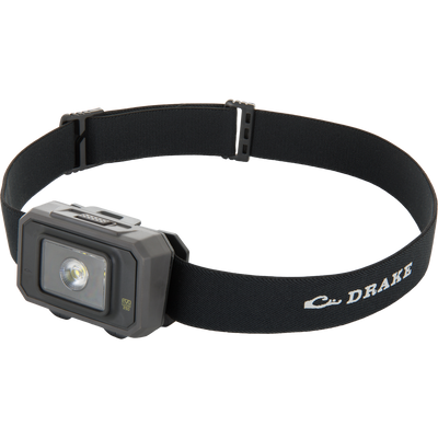 Lumen Headlamp EVO250 on adjustable black elastic head-strap, offering 250 lumens with dual-fuel capability, ideal for versatile outdoor and hunting use.