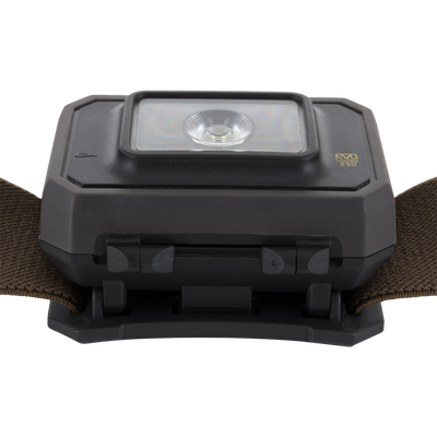 Close-up of Lumen Headlamp EVO250, showcasing its compact LED housing and adjustable headstrap, ideal for versatile outdoor use with multiple brightness settings and dual-fuel capability.