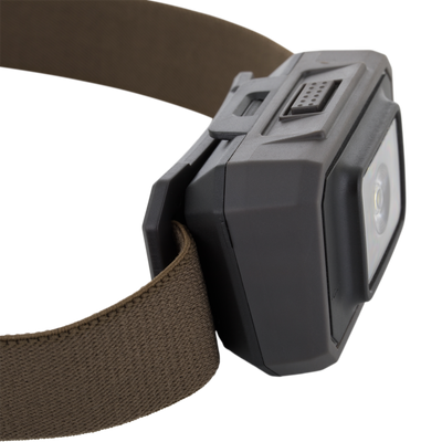 Lumen Headlamp EVO250 with adjustable headband, featuring a mode switch and lens, designed for versatile outdoor use with dual-fuel capability.