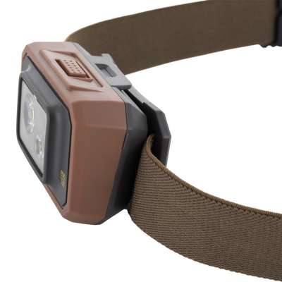 Close-up of the Lumen Headlamp EVO350 with multi-LED lens, push-button, and adjustable headband, ideal for versatile hands-free lighting in outdoor activities.