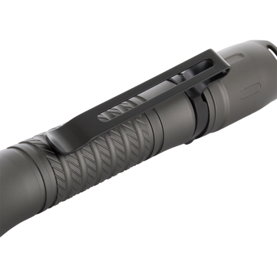 Close-up of Lumen Flashlight EVO500, showing knurled grip and pocket clip, highlighting its compact design and dependability for versatile hunting and outdoor use.
