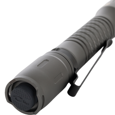 Lumen Flashlight EVO500 close-up showing ridged barrel, rubberized tail-cap button, and pocket clip, ideal for hunting gear with 500 lumen output and waterproof durability.