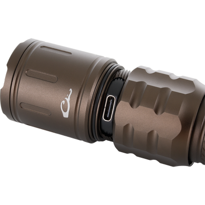 Lumen Flashlight EVO1000 close-up showing anodized grooved body, threaded joints with O-ring, USB-C port; ideal for outdoor and hunting use.
