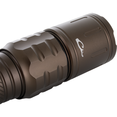 Lumen Flashlight EVO1000's anodized, knurled grip and rubber O-ring seal, showcasing its durable build for versatile outdoor and everyday use.